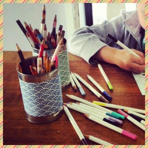 Pencil holders: cans covered with origami paper